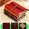 A stack of red and brown leather-bound A6 journal notebooks tied with twine, featuring a decorative butterfly clasp.