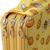 A yellow pencil case with a zipper closure and a pattern featuring orange and white fruit designs.