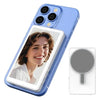 A light blue smartphone case with a magnetic rear camera monitor attached, shown next to the detached monitor.