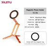 Orange magnetic phone holder with a circular ring and folding arms