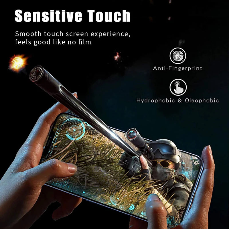 A hand holds a smartphone displaying a screen protector, demonstrating a sensitive touch experience.