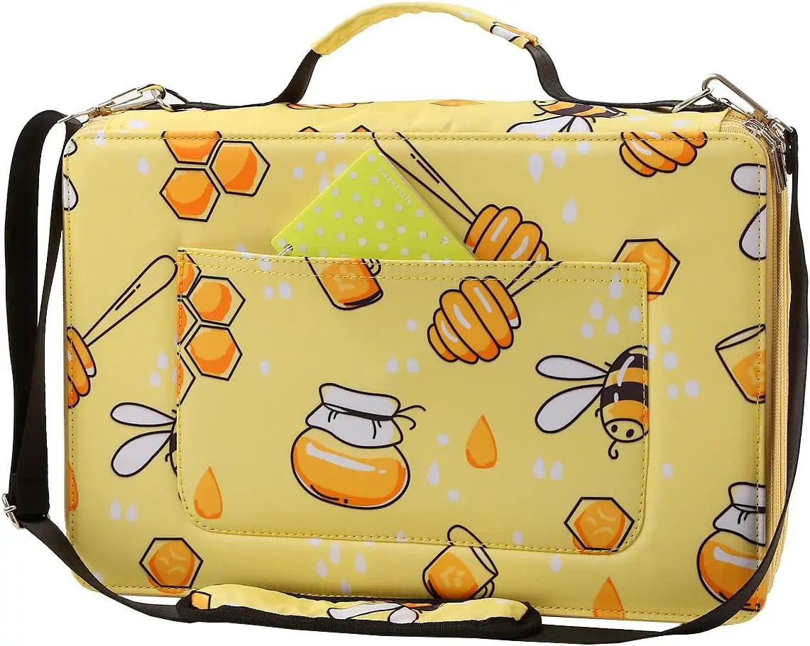 A yellow pencil case with honeycomb patterns and multiple compartments is shown.