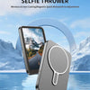 A gray magnetic phone selfie thrower device is shown next to a smartphone, set against a snowy mountain background.