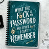 A teal spiral notebook titled What the fuck is my password and other shit I can't remember with decorative swirls.