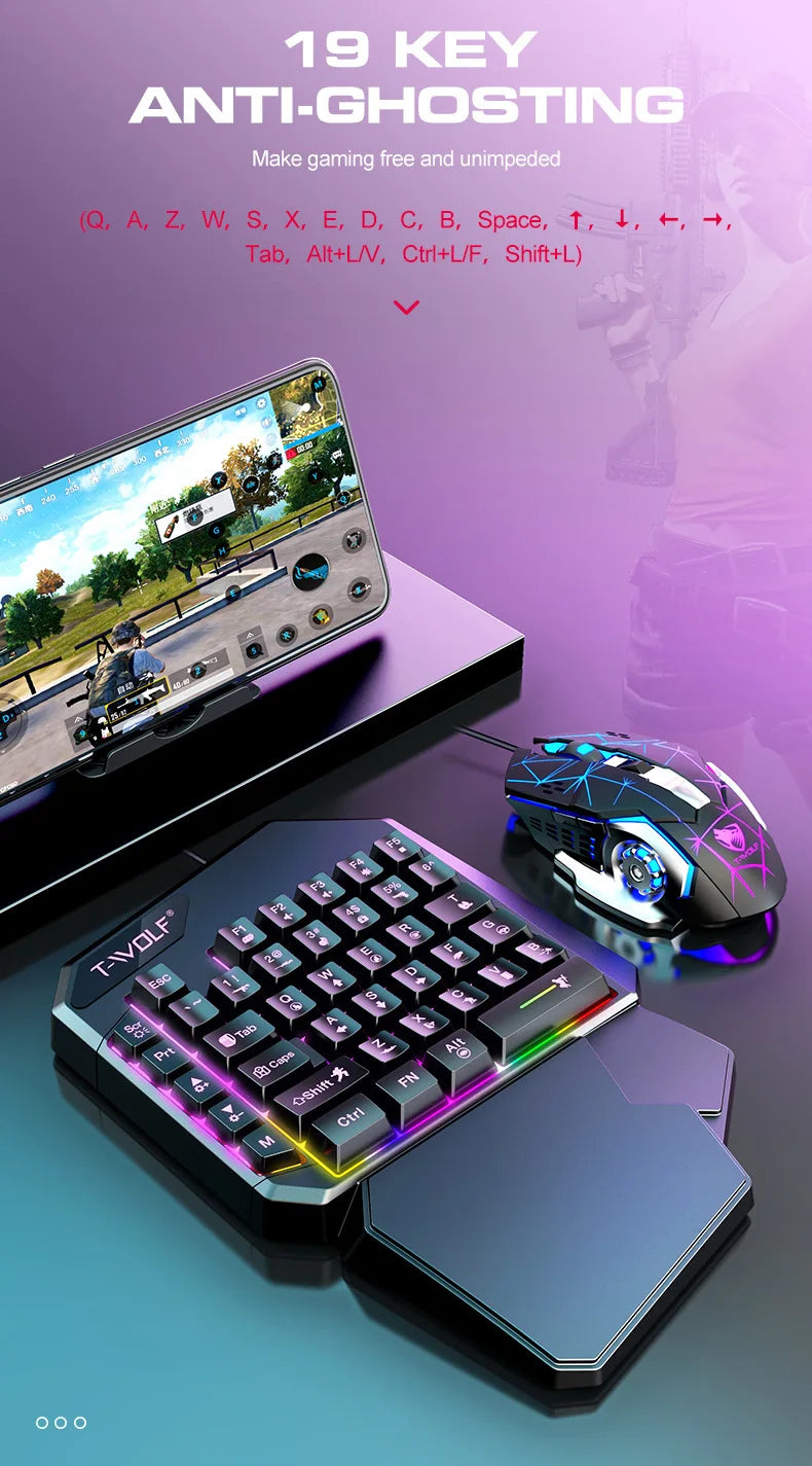 A black T-Wolf mobile gaming keyboard and mouse combo with a laptop displaying a game.