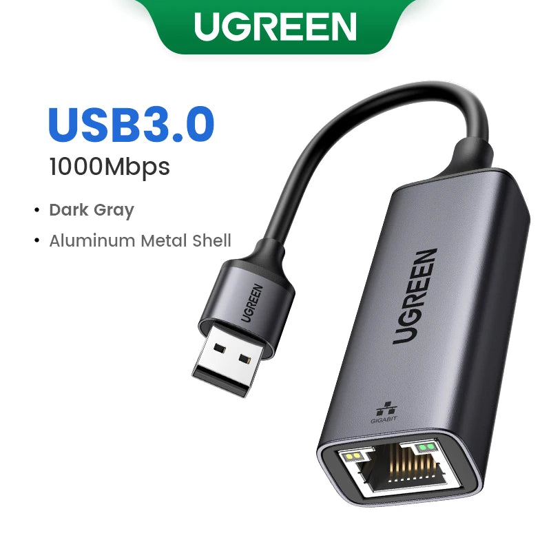 A dark gray UGREEN USB 3.0 to Ethernet adapter with an aluminum metal shell and a connector.