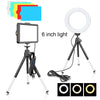 A tripod-mounted 6 inch light with multiple colored light panels and a circular LED light head.