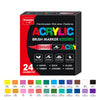 A box of GuangNa Acrylic Brush Markers featuring 24 colors and tips for paper, rock, glass, timber, ceramic, and canvas.