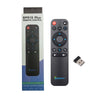 A black remote control for a wireless gyro air mouse featuring buttons and a USB connector.