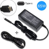 A black replacement AC adapter for a 65W USB-C laptop charger, including the power brick and cable.