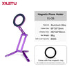 A purple magnetic phone holder with a circular ring and legs is shown against a white background.