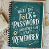 A teal spiral notebook titled What the fuck is my password and other shit I can't remember with a gold key design.