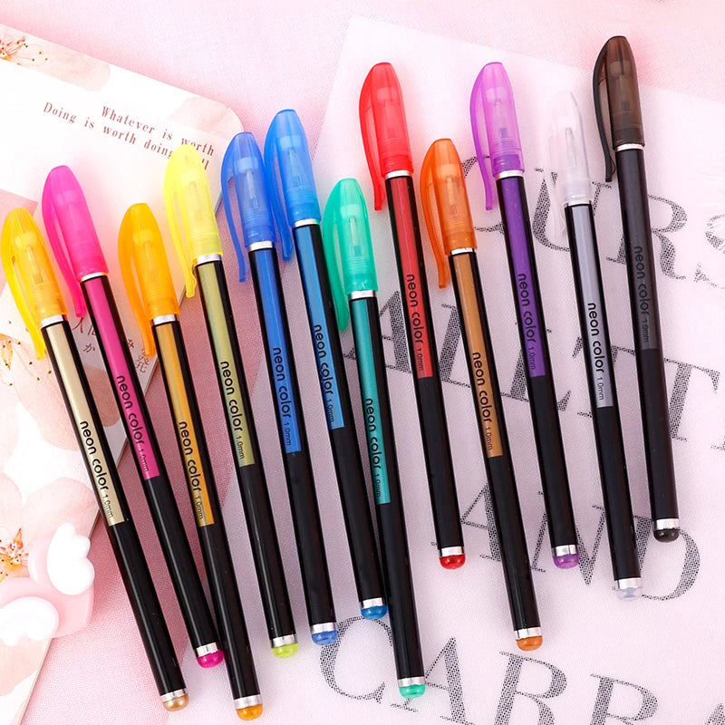 A collection of twelve glitter gel pens in various bright colors including pink, yellow, blue, and orange
