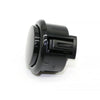 A black arcade push button game switch with a cylindrical body and a rectangular plunger.
