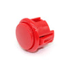 A bright red arcade push button game switch with a round top and rectangular body.