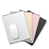 A stack of premium aluminum and PU leather mouse pads in various colors, including white, beige, pink, and black.