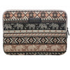 A patterned canvas laptop sleeve featuring elephants and geometric designs.