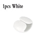 One white silicone cable organizer clip.