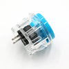 Clear plastic arcade push button game switch with a blue cap and black internal components