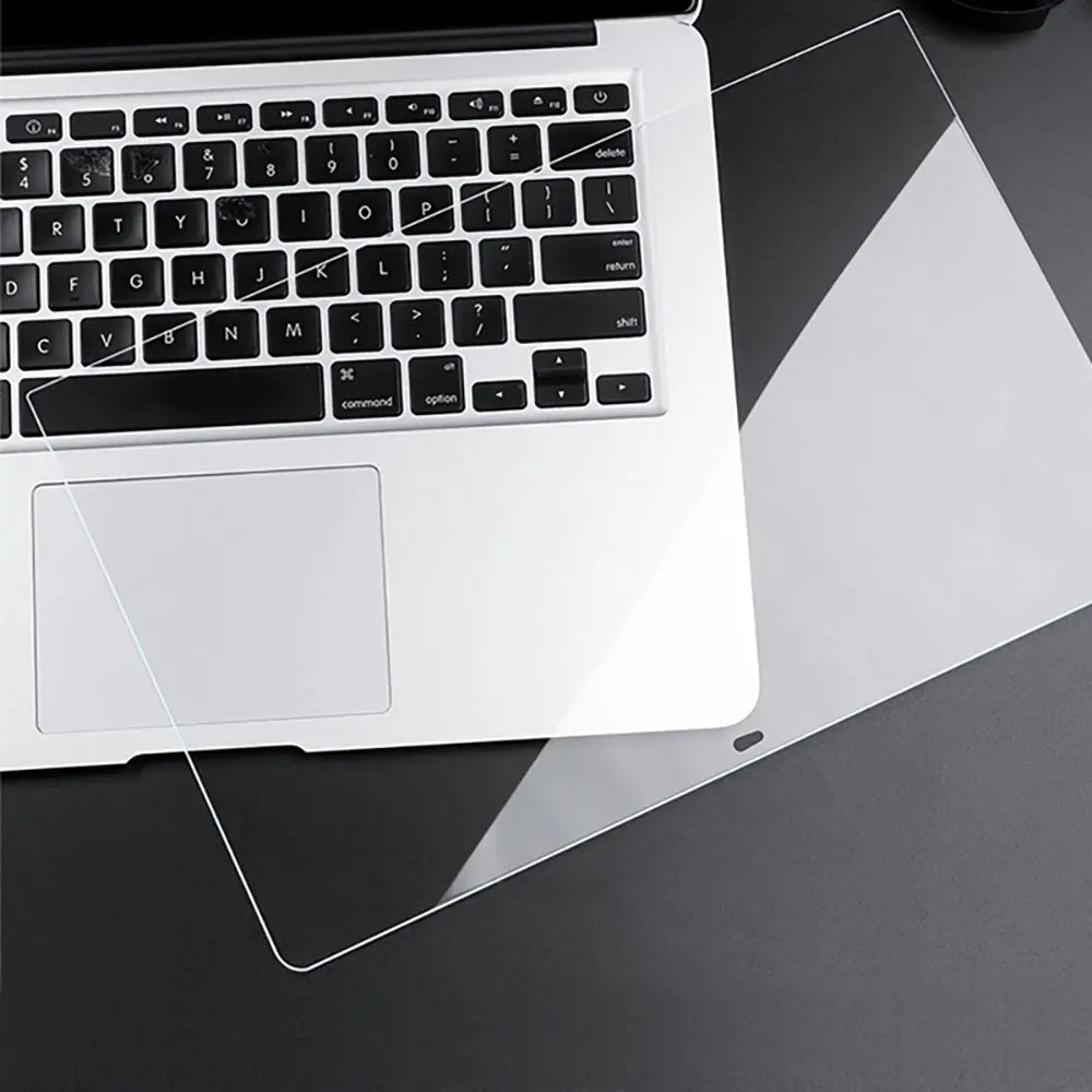 HD clear screen protector placed on a white laptop keyboard and screen.