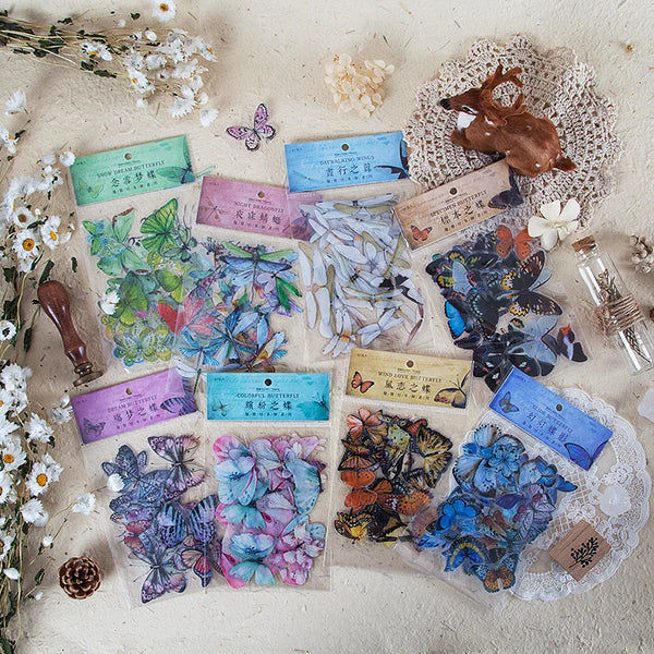 A collection of colorful butterfly wings PET stickers in various shades and patterns for scrapbooking