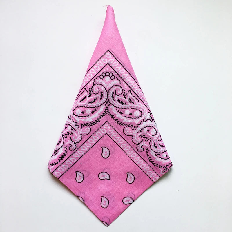 Pink cotton bandana square scarf featuring a paisley print with black detailing.