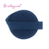 A dark navy blue elastic hair tie or trim for hair.
