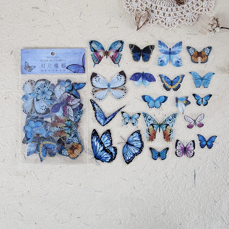 A collection of colorful butterfly wings in a clear plastic sheet for scrapbooking and journaling