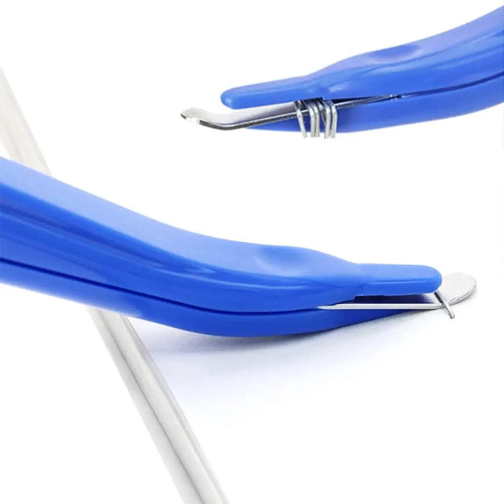 A pair of blue magnetic staple removers with push-button action tools shown against a white background.