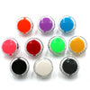 A collection of round, colorful push button game switches in various colors including red, purple, blue, green, orange, and b
