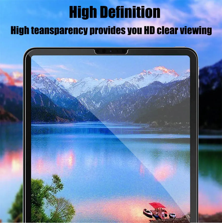 A tablet displaying a high-definition scenic landscape with mountains, water, and reflections.