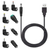 Un juego de cables universales multi-conector para carga DC con diversas puntas y un cable enrollado negro.