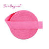 Pink bristlegrass elastic hair ties and trims rolled up