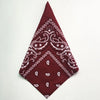 A deep maroon bandana square scarf featuring a white paisley print.