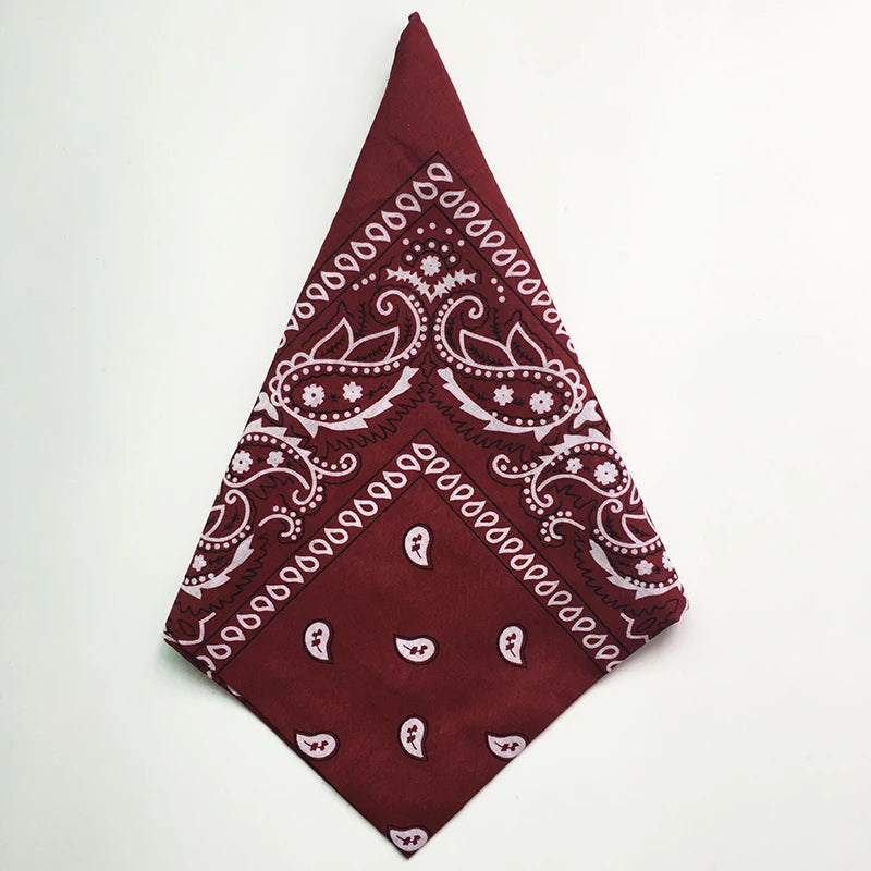 A deep maroon bandana square scarf featuring a white paisley print.