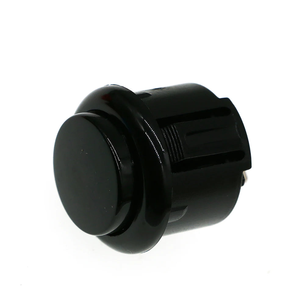 A black arcade push button game switch with a cylindrical body and a round top.