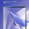 A close-up view of an iPad screen protector showing a blue whale graphic against a purple sky and clouds.