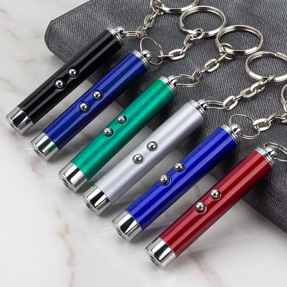 Un set de llaveros punteros láser con cuerpos cilíndricos de varios colores y cierres de plata.