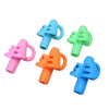 A set of four colorful ergonomic silicone pencil grips for kids in pink, blue, green, and orange.