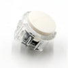 Clear plastic arcade push button game switch with a white top cap