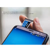 A hand holds a smartphone displaying a memory card, demonstrating the ease of downloading media files.