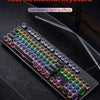 A close-up view of a retro punk mechanical keyboard with colorful keycaps and dynamic lighting effects.