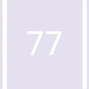 A close-up of a white number 77 displayed against a light purple background.