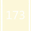 A close-up of a white number 173 on a pale yellow background.
