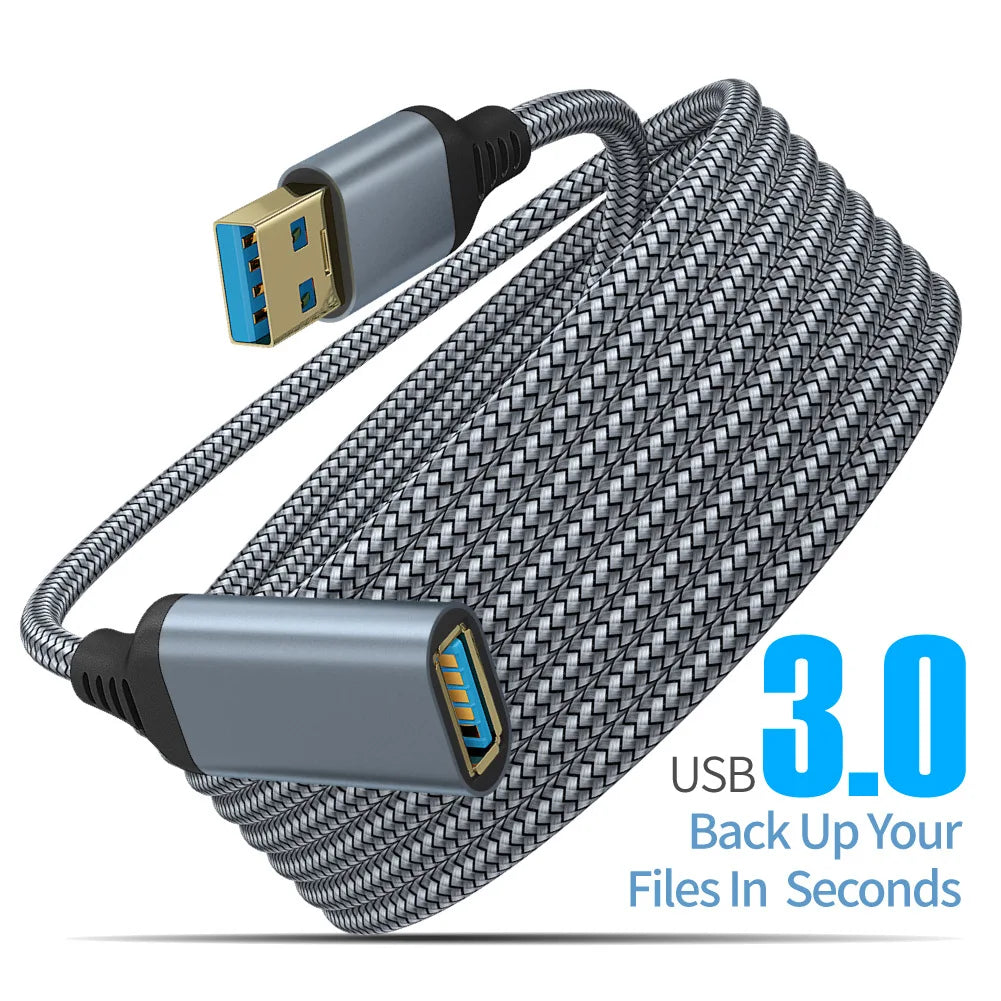 A coiled gray USB 3.0 cable with a Type-C connector and a USB plug is shown against a white background.