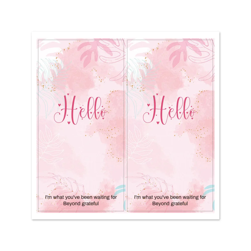 Pink rectangular gift stickers with handwritten Hello text and grateful message on a light background