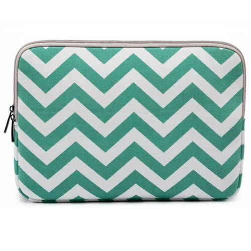 A teal and white chevron patterned canvas laptop sleeve for a MacBook or PC.