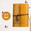 A vintage butterfly PU leather A6 journal notebook with gold accents and a brown leather tie.