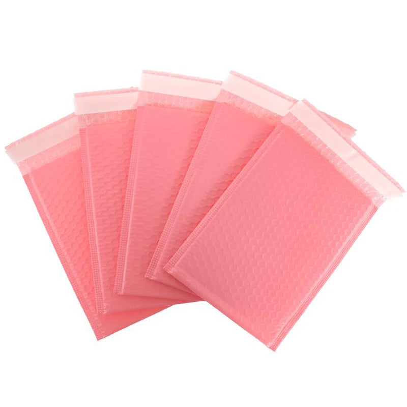A pack of pink bubble mailers, self-sealing padded envelopes.