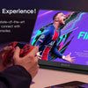 A person is using a portable display monitor to play FIFA 21 on various gaming consoles.